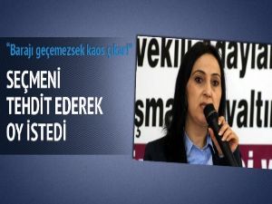 Seçmeni tehdit ederek oy istedi