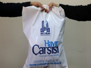 Hayır Çarşısı'dan öğrencilere kışlık giysi yardımı