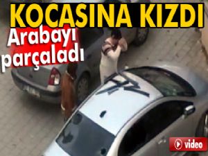 Eşiyle tartışan kadın, öfkesini kocasının otomobilinden çıkardı