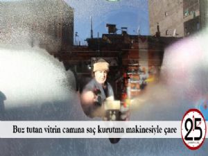 Buz tutan vitrin camına saç kurutma makinesiyle çare