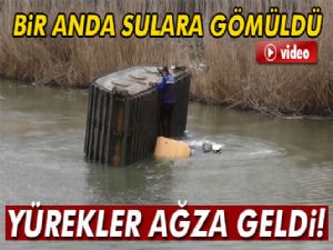 Suya giren iş makinesi alabora oldu