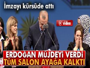 Erdoğan müjdeyi verdi, imzayı kürsüde attı