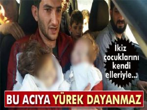 İkiz çocuklarını kendi elleriyle defnetti